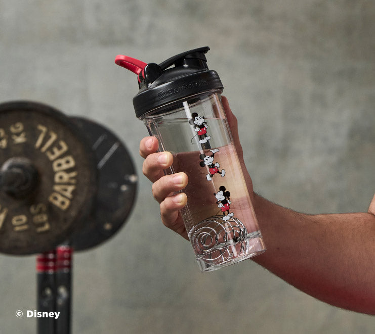 pro-series-x4 Mickey_Mouse_Protein_Shaker_Bottle_Being_Held_In_the_Gym.jpg
